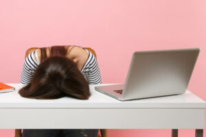Website user frustrated by web design mistakes.